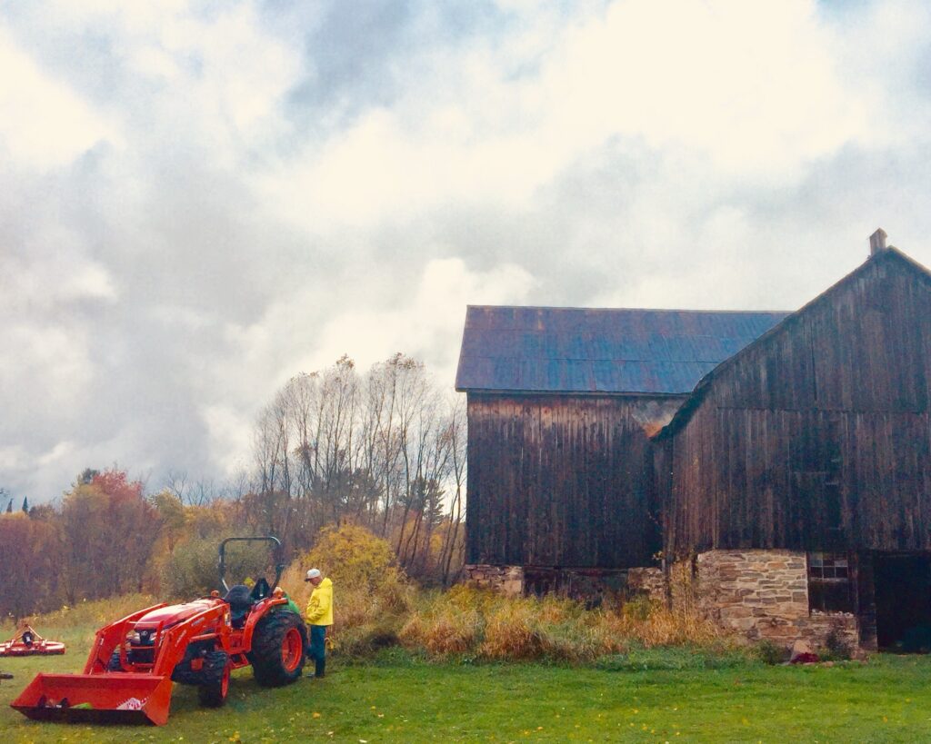 main barn the son barr gilmore with tractor